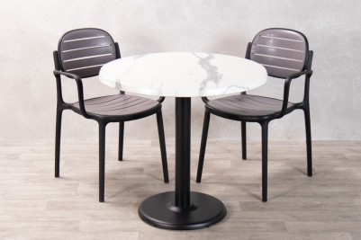 white-marble-table-with-dark-grey-florida-chairs