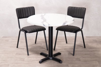 white-marble-round-top-with-x-bottom-base-and-chairs