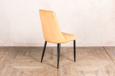 yellow minimalist legged velvet chair