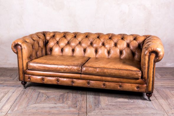 tan leather Chesterfield sofa