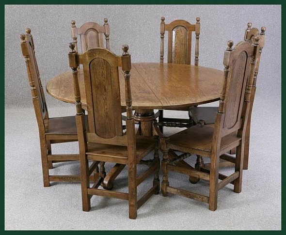 Handmade solid oak oval extending table