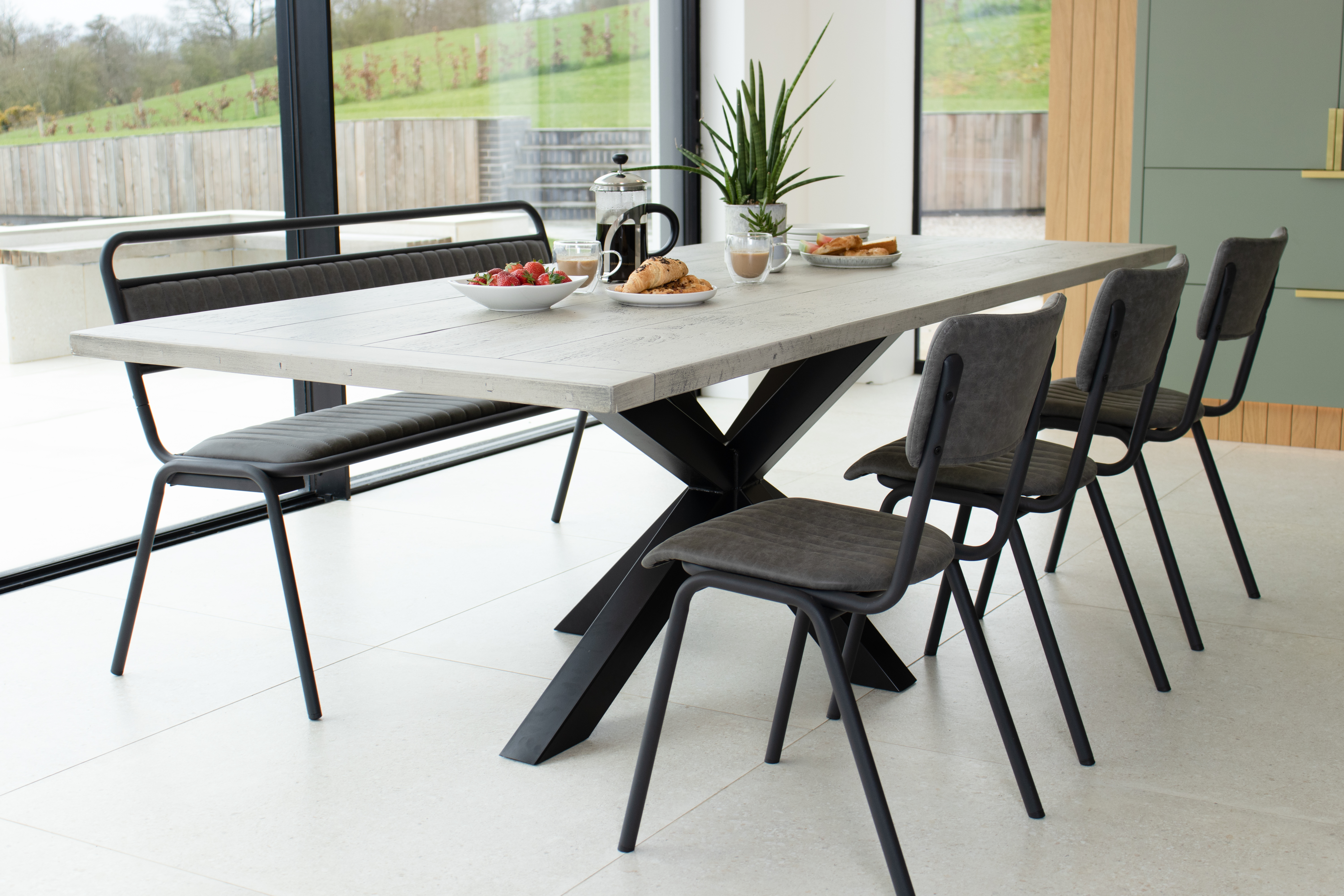 oversized industrial star base dining tables