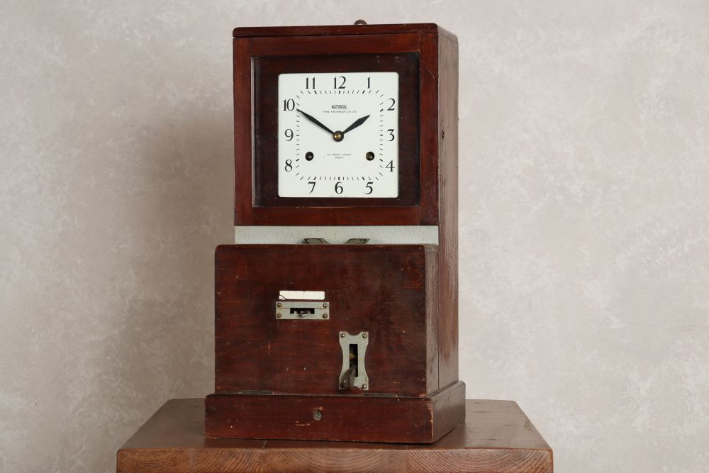 vintage clocking in machine